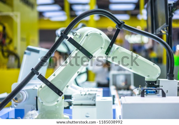 The robot arm on the\
production line