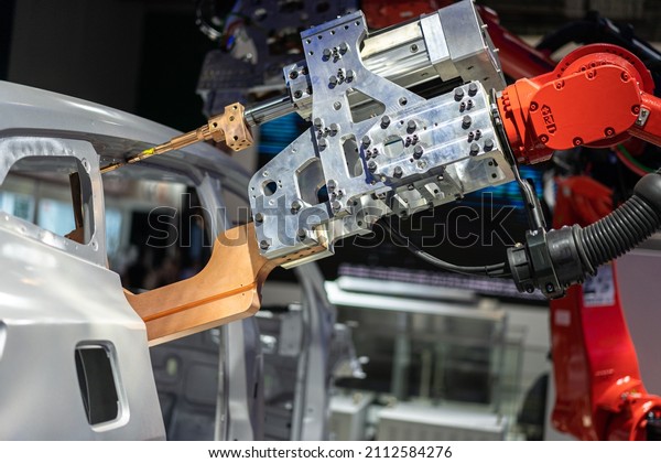Robot arm working in car\
factory