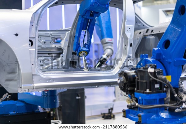 Robot arm working in car\
factory
