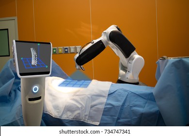 the robot assistant in medical technology use for scan a patient before spinal surgery and send the data of 3d spinal to the monitor on robot it help to pinpoint instrument accuracy for quicker, safer - Powered by Shutterstock