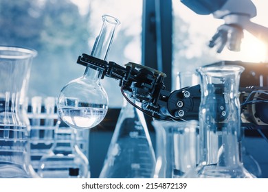 A Robot in a chemical laboratory assists humans in the most dangerous operations. - Shutterstock ID 2154872139