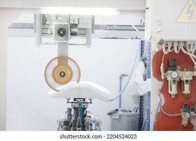 robot cutter, making surfboards from a manufactured foam shape - Powered by Shutterstock