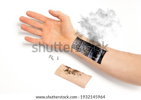 Robot hand inside human hand - Prosthesis concept, short cirquit, isolated on white