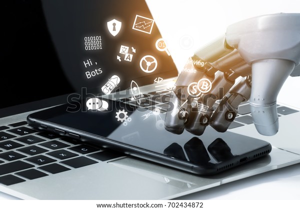 Robot Hand Use Mobile Phone On Stock Photo (Edit Now) 702434872