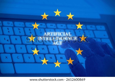 Robot hand using a computer with the European Flag as background, concept of artificial Intelligence Act.