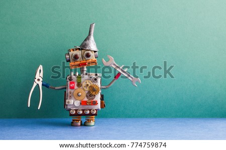 Robot handyman pliers hand wrench. Fixing maintenance concept. Creative design robotic with metal funnel hopper, cogs wheels gears silver metallic body. Green wall, blue floor background. Copy space 