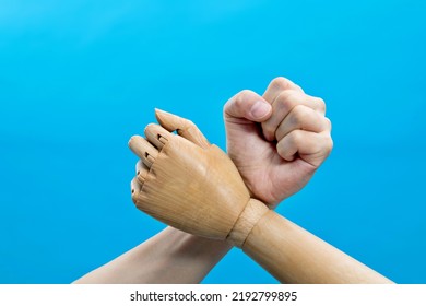 Robot And Human Hand Arm Wrestling.