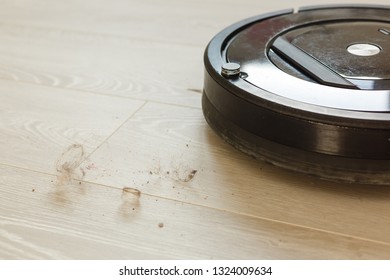 Robot Vacuum Cleaner To Pick Up Dirt Prepared A Wooden Floor