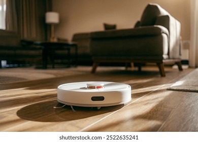 Robot vacuum cleaner vacuuming dust at home with no people around.