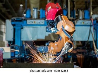 Robot Welding Is Welding Assembly Automotive Part In Car Factory