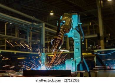 Robot Welding Automotive Part In Car Factory
