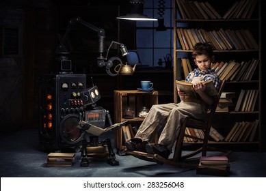 Robot-child and the mechanic and inventor read books in the studio late at night - Powered by Shutterstock