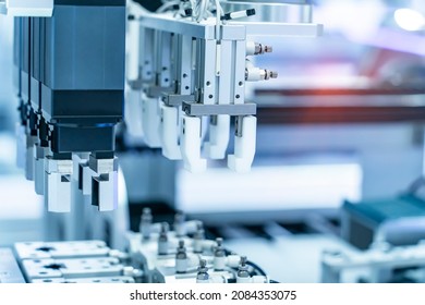 robotic arm catch for electronic assembly line. The robot for smart technology manufacturing process. - Shutterstock ID 2084353075