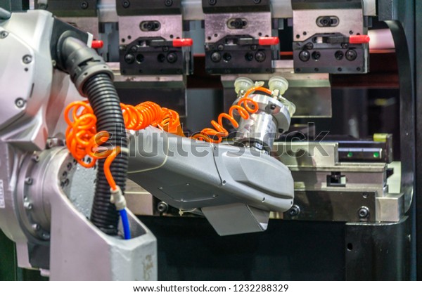 robotic arm at\
industrial manufacture\
factory