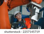 robotic arms. Engineer manager checking and controling automation robot arms machine in intelligent factory industrial on real time monitoring system software. digital manufacturing operation.