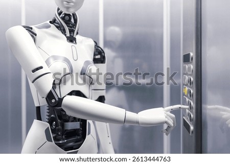 Robotic humanoid pressing a button on the control panel in the elevator, hand close up