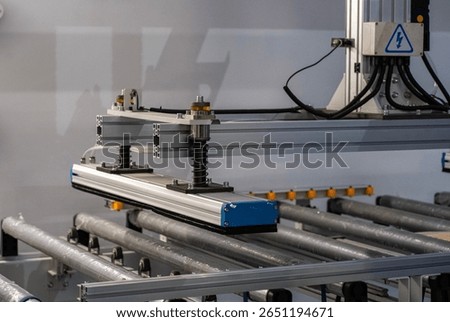 Robotic Machine Frame with Spring Assembly and Conveyor Rollers – Industrial Automation Detail