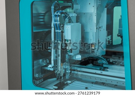 Robotic Manufacturing Process. Precision Assembly Robot Executing Highspeed Electronic Component Placement