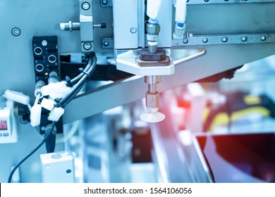 robotic pneumatic piston sucker unit on industrial machine,automation compressed air factory production - Shutterstock ID 1564106056