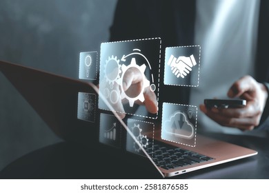 Robotic process automation concept, RPA, artificial intelligence. Man use laptop with virtual automation technology to automate business tasks with AI. Digital transformation and change management.