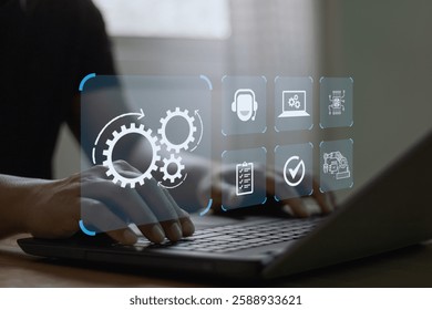 Robotic Process Automation (RPA) technology to automate business tasks with AI.  Digital transformation and change management. Concept with engineer setting up automated software on a laptop computer.