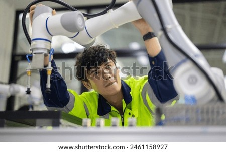 Robotic trainees learn operating, programming, troubleshooting, and quality control through practical workshops and demonstrations of robotic arms and systems in the manufacturing training academy.