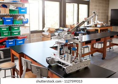 Robotic Vehicle On Desk In Empty Science Classroom