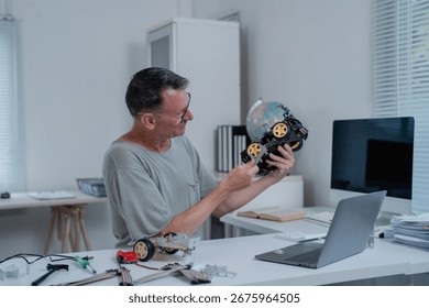 Robotics engineer assembling a toy car in a bright, modern office, focusing on the project with a laptop and soldering iron, showcasing skills in electronics and innovation