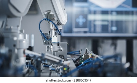 Robotics Industry Four Engineering Facility Robot Arm Moving at Different Directions. High Tech Industrial Technology Using Modern Machine Learning. Mass Production Automatics. Close Up
