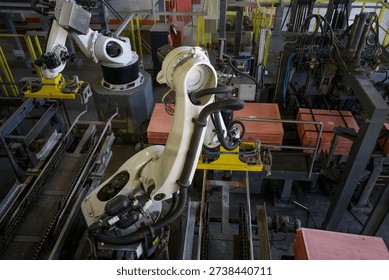 Robots for stripping pure copper from cathode. Workshop of electrolysis in copper foundry.