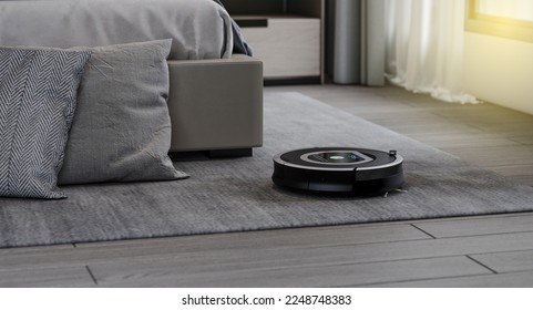 Robots vacuums cleaners on carpet in living room for cleaning pet hair and dust. - Powered by Shutterstock