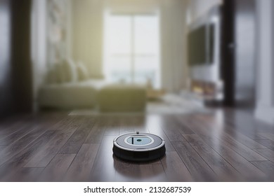 Robots Vacuums Cleaners On Wood Floor  In Living Room For Cleaning Pet Hair And Dust. Selective Focus.