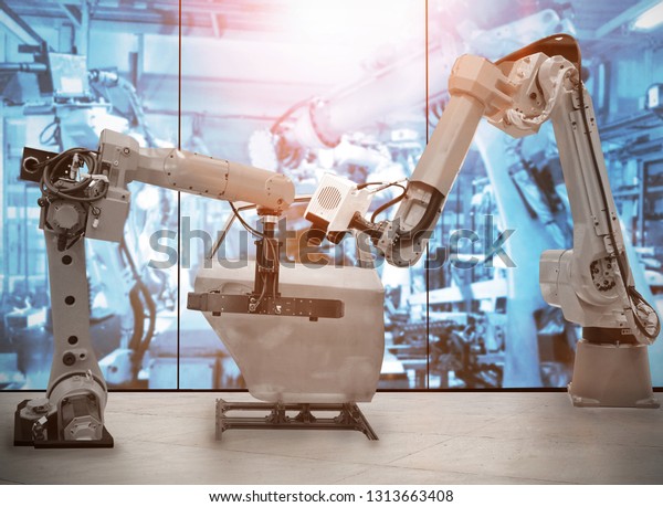 robots are working  in the automotive industry\
smart factory background