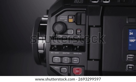 The robust camera control panel displays its intricate dials.