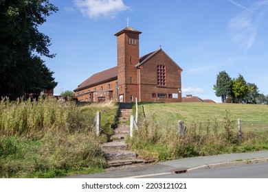 Rochdale, United Kingdom - 17th Sept 2022: Holy Family Catholic Church On Kirkholt Council Estate In Rochdale On A Clear Day.