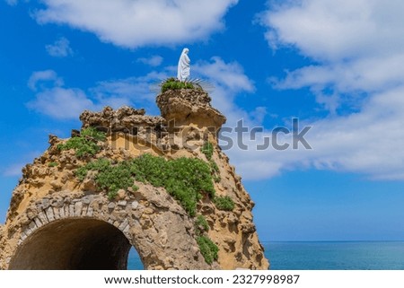 The rocher de la vierge (virgin mary rock) in Biarritz. Aquitaine, Basque Country, France.