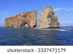 Rocher Perce Rock and Atlantic Ocean on the foreground in Gaspe Peninsula, Quebec, Canada