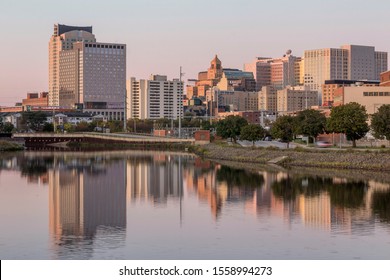 ROCHESTER, MN - OCTOBER 2019 - A Sunrise Skyline Shot Of Rochester, Minnesota, Reflecting In Silver Lake During An Early Fall Morning