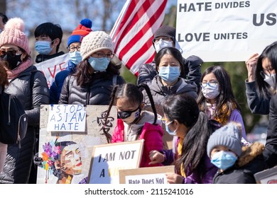 Rochester, New York - April 3, 2021: Stop Asian Hate Rally Group Protesters With Signs