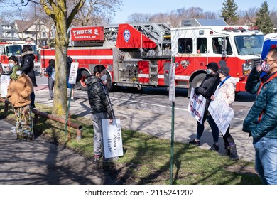 Rochester, New York - April 3, 2021: Stop Asian Hate Rally With Fire Truck After Car Crash