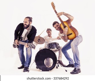 rock band performing in a studio - Powered by Shutterstock