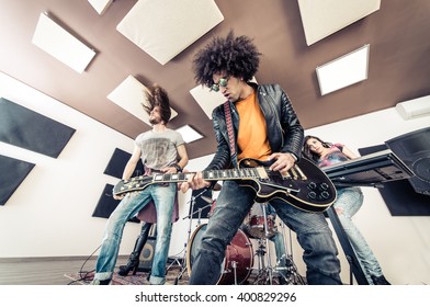 Rock Band Playing Hard Rock In The Studio. Concept About Entertainment And Music