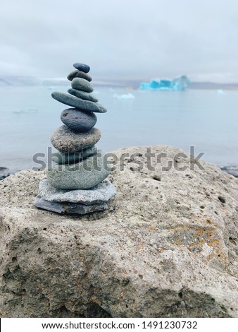 Rock cairn next to Jökulsárlón glacial lake in Iceland
