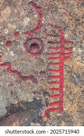 Rock Carvings On A Rock Face