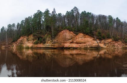 Devil’s Rock And Devil’s Cave
The Last Greatest Rock Wall Of The Gauja Valley, 15 M High. 8 M Below Water Level, The Devil’s Cave – An Ancient Place Of Worship. Near Sigulda, Latvia