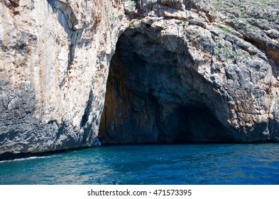 Rock Caves And Cristal Water Coastline Landscape In Salento, Apulia, Italy