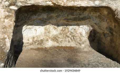 Rock City. Entrance To A Man-made Cave In A Limestone Rock. A Place Of Refuge For Residents And Monks. Living Room, Stone Bed