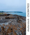 Rock cliff view around Curl Curl Beach, Sydney, Australia.