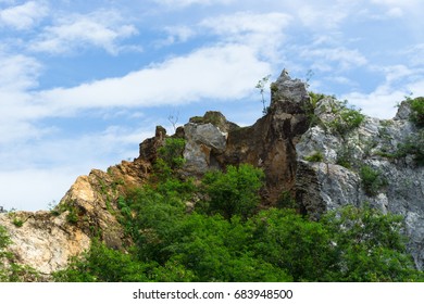 Rock cliffs with green trees. - Shutterstock ID 683948500