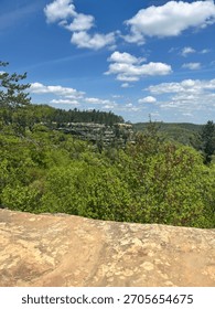 Rock Cliffs overlooking the Valley Below